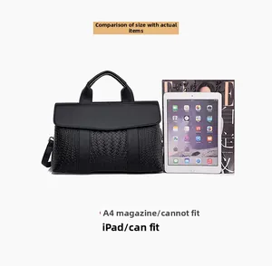 Detailed internal capacity view of black woven handbag showing fit for iPad vs A4 magazine