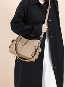 Beige genuine leather hobo bag with drawstring detail and adjustable strap for women