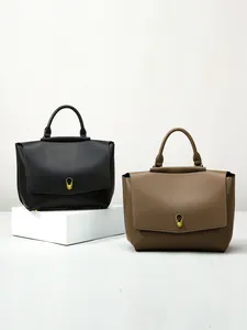 Minimalist leather tote handbag with gold teardrop lock in black and khaki colors