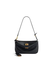 Elegante schwarze Schultertasche aus pflanzlich gegerbtem Leder mit goldener Schnalle