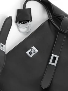 Classic black leather shoulder bag with silver turn-lock and premium matte finish