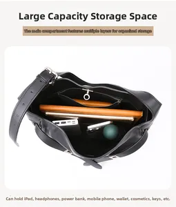 Spacious interior of a black leather bucket bag with multiple storage compartments