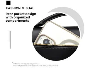 Detail of back pocket on black leather bag with gold zipper showing phone storage space
