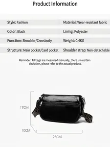 Sac bandoulière noir brillant à texture craquelée avec sangle géométrique et design tendance