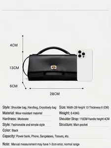 Minimalist black rectangle handbag with gold clasp, dimensions 28x13x6cm, shown with iPhone