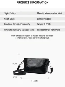 Minimalist black leather crossbody bag with adjustable strap and wear-resistant texture