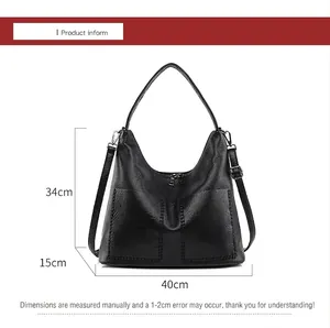 Detailed view of black litchi pattern leather tote bag with dimensions 40cm x 34cm x 15cm
