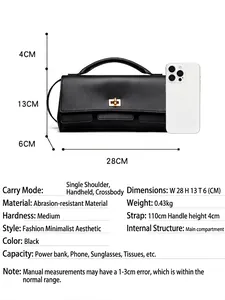 Minimalist black crossbody bag with adjustable strap and size dimensions of 28x13x6cm