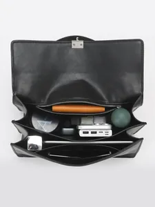 Minimalist large black leather shoulder bag with spacious multi-compartment interior