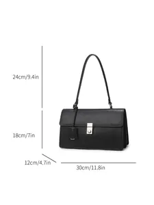 Black minimalist leather shoulder bag with silver hardware and product dimensions