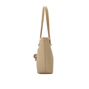 Side view of large khaki tote bag showing lychee grain texture and gold metal ring