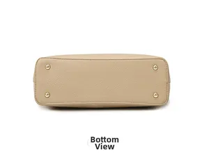 Detail view of beige lychee leather tote bag bottom with four gold metal protective studs