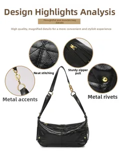 Detail view of the black quilted shoulder bag with golden hardware and zipper close-up