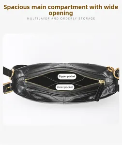 Detailed top view of the black quilted crossbody bag showing spacious interior with pockets