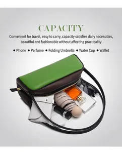 Vista superior del bolso cilíndrico bicolor con gran capacidad para paraguas y móvil