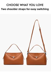 Detail of brown leather tote with silver T-buckle and dual shoulder strap options