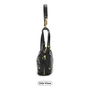 Detail view of black quilted leather shoulder bag with gold zipper and side buckle
