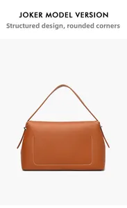 Detail of brown grain leather pillow bag with white contrast stitching and firm shape