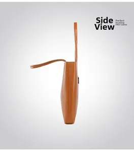 Detail view showing the sleek side profile and slim shoulder strap of the brown tote bag