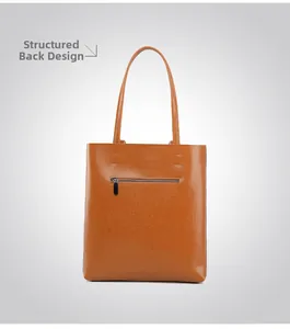 Rear view of brown oil wax leather tote bag with functional back zipper pocket