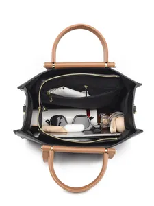 Women's minimalist embossed leather tote bag with dual-tone black and brown finish