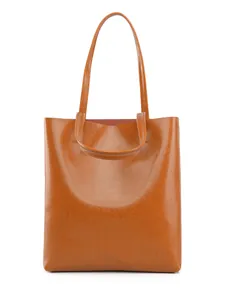 Brown oil wax leather tote bag with large capacity and dual handles for daily commute