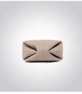 Detailed view of the textured pebbled leather bottom with reinforced stitching and folds