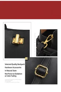 Detail of gold hardware, twist lock, and lobster clasp on black leather bucket bag