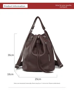 Detailed view showing dimensions 36x29x18cm of dark brown pebbled leather backpack