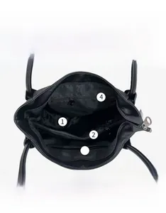 Detailed view of tote bag interior layout featuring multiple compartments and pockets