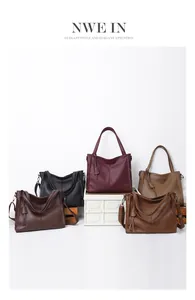 Detail view of large faux leather tote bags in five colors with decorative tassels