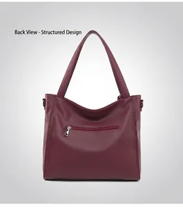 Detailed back view of burgundy pebble leather tote bag showing a horizontal zipper pocket