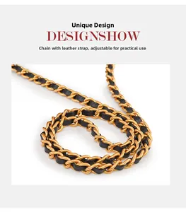 Detail of sliding gold metal chain strap with interwoven black leather for shoulder bags