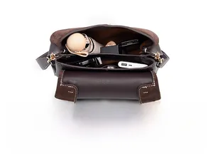 Top view showing large capacity double pockets of dark brown pebbled leather handbag