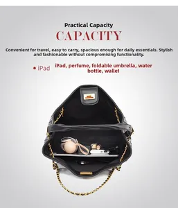 Spacious interior of a black woven leather bucket bag showing capacity for iPad and umbrella