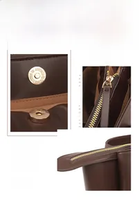 Detail showing high-quality metal hardware, smooth zipper, and stitching on dark brown tote bag