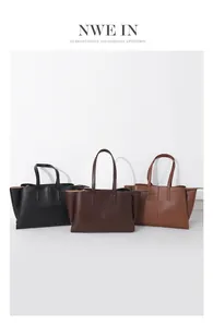 Three elegant leather tote bags in black, coffee, and tan colors in a minimalist setting