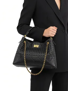 Black woven leather bucket bag with gold chain strap and quilted texture detail