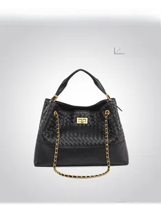 Close-up of black woven leather bucket bag with quilted detail and gold twist lock