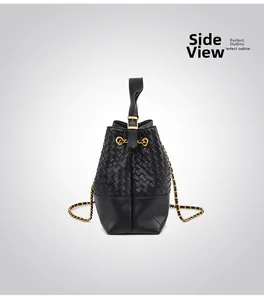 Side view of black woven leather bucket bag with gold chain and refined silhouette