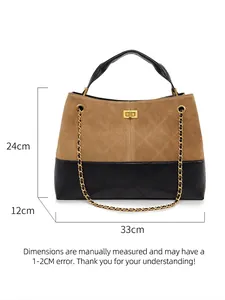 Women's vintage tote bag with brown suede and black quilted leather, dual-tone handle design