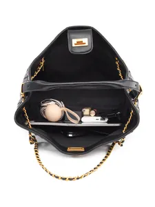 Large black woven leather tote bag with gold hardware and spacious interior view
