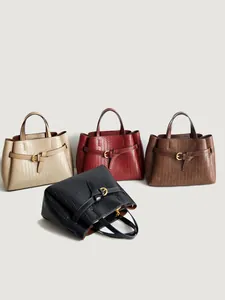 Fashionable woven leather tote bag for women in four elegant colors with a metal buckle