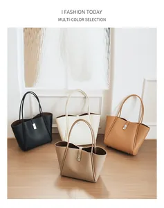 Detailweergave van vier minimalistische draagtassen in zwart, crème, karamel en beige