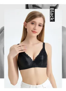 Detail of elegant black lace mulberry silk bra showing floral embroidery and V-neckline