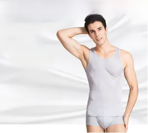 Detailed view of grey silk knit vest and boxers set showing smooth breathable fabric texture