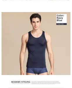 Close-up of navy blue silk knit men's vest and boxer set with smooth glossy fabric texture