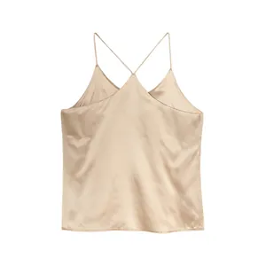 Elegant champagne gold silk satin camisole with thin cross straps and V-neckline