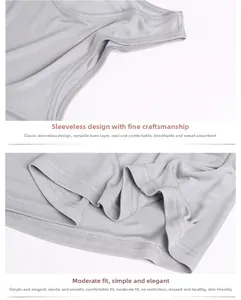 Detail view of light grey silk vest showing the fine fabric texture and neat stitching