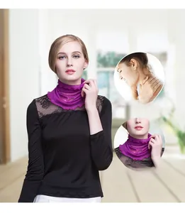 Detail of purple silk neck gaiter with ruffle edge shown on a model for warmth